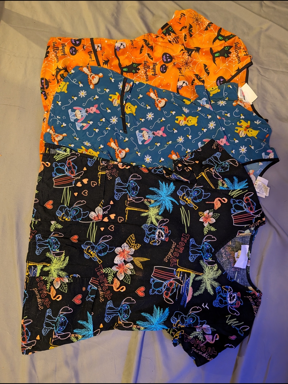 Colorful Halloween, Winnie The Pooh, And Stitch Scrub Tops - 3 Pack - Picture 1 of 7
